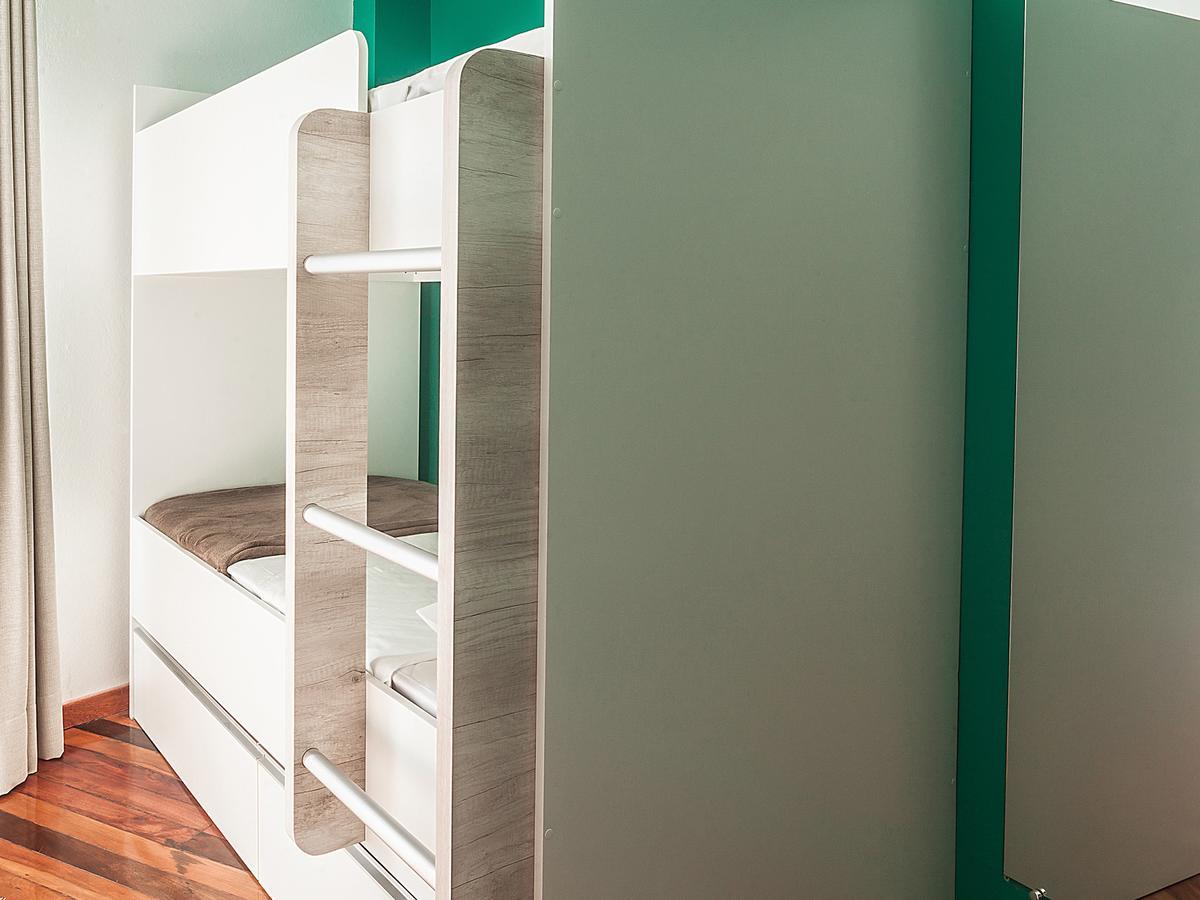 Cama em Dormitório Misto com 4 Camas